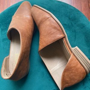 Camel colored cut out flats.